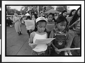 Group of elementary school age children of Vietnamese origin singing, Our Lady of Peace, San Jose, California, 2002