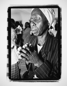 Woman praying, Rwanda, 2004