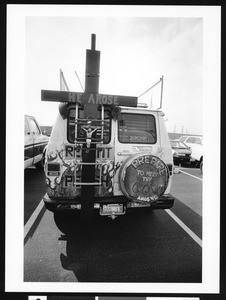 Van covered in religious articles and paintings, Los Angeles, 1999