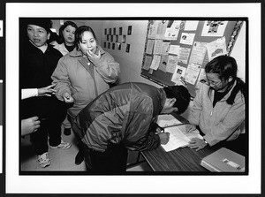 Registration for Food distribution program to people of South American origin, United Methodist Church, Leesburg Pike, Falls Church, Culmore, Virginia, 2002