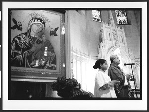 Celebrating Mass, interior of Saint Patrick's Catholic Church, San Francisco, California, 2002