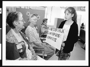 Little girl with elderly women, Los Angeles, 1999