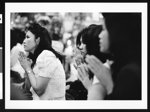 Women praying, Los Angeles, 1999