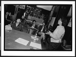 Woman of Chinese origin giving lecture, Cameron House, Family Day, Chinatown. San Francisco, California, 2002