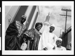 Men, woman and a child in traditional African dress, Los Angeles, 1999