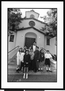 Group of children on steps of church, Dolores, Los Angeles, 1996