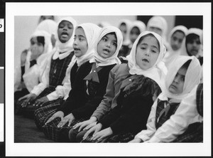 Group of girls praying, Los Angeles, 1999