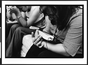 Prayer group sponsored by the Church of God, with people of South American origin, in a private home, Richmond, California, 2002