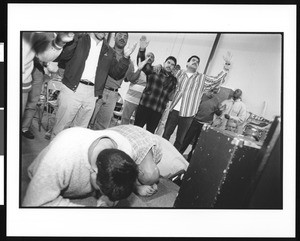 Group of men in prayer and in trance, Victory Outreach Church, North Hollywood, California, 1996