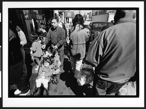 Crowds of people walking on Sacramento Street, Chinatown, San Francisco, California, 2002