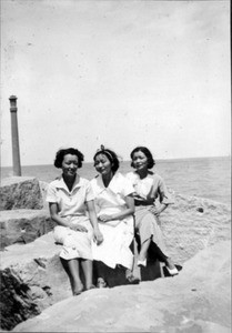 Helen, Soon Bohk and Sunda Hur at beach in dresses