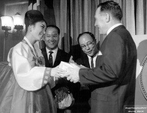 Edward Paik, woman, Mayor Sam Yorty