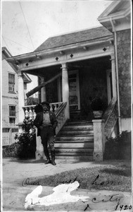 Charles Lee in front of house