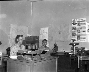 Edward Paik with his feet on his desk