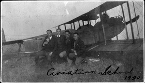 Young Lee, Byun Hoon Chang, Charles Lee and another man in front of an airplane