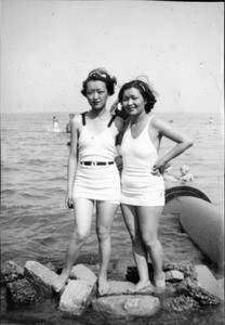 Soon Bohk and Helen Hur in bathing suits at beach