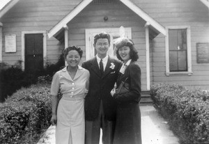 Mary Chun Lee with a man and woman