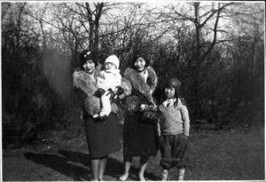 Richard Hahn in pilot helmet, Soon Bohk Hur, Selma Hahn and Sunda Hur