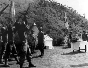 Guns fired at a memorial service