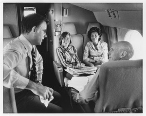 Governor Jerry Brown and Yvonne Brathwaite Burke on an airplane, ca.1967-1973 or ca.1979