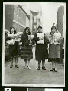 Women holding petitions for Congress to dole $25 to every jobless person per week, 1931