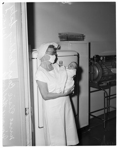 New Year baby born at Burbank Hospital at midnight plus 20 seconds, 1955