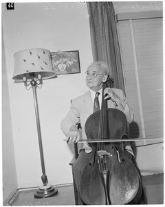 Cellist wins suit, 1956