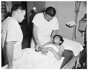 Boy hurt in fall, 1953