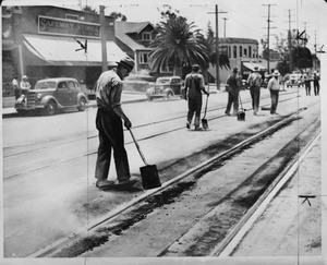 City workers paving around streetcar tracks, Los Angeles, 1936