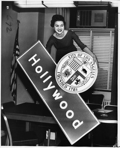 Hollywood marking sign with seal of the City of Los Angeles, 1960