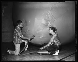 Warren Hillman--18 years (with balloon which he designed and announced he would fly against warning from Civil Aeronautics Administration), 1957