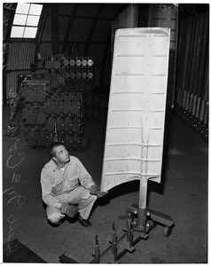 Man caught in experimental cooling tower at 2500 South Atlantic Boulevard, 1954