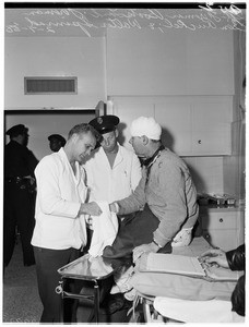 Gas attendant robbed--beaten, 1958