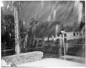 Light poles down at 46th Street between San Pedro Street and Avalon Boulevard, 1954