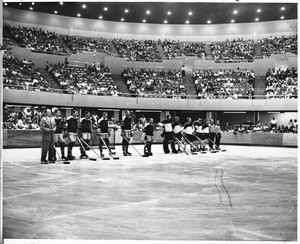 Hockey players on rink at the Los Angeles Memorial Sports Arena, 1959