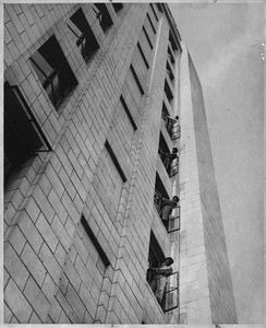 The four men who keep the 1,700 windows in the City Hall clean, 1949