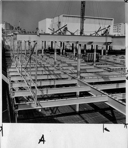 The Hall of Records is shown in girder construction stage, 1960