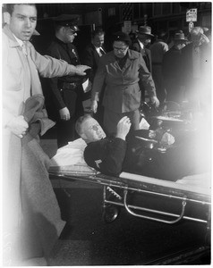 Motorcycle officer hit on bike, 1953