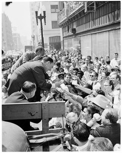 Stevenson at garment workers at 8th Street and Santee, 1956