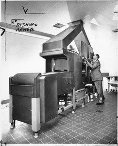 Heavy duty dishwasher at the County Courthouse restaurant, 1959