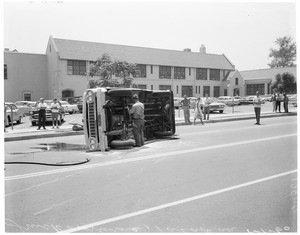 Pickup truck overturns (Pasadena), 1960