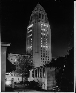 To celebrate the new year the City Hall building emblazened the lights of its windows to read "54", 1954