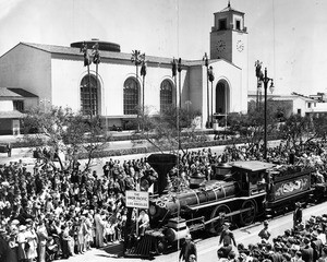 Crowds watch train celebrating completion of the new Union Station, 1939