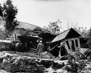 Condemned Chavez Ravine house gives way to bulldozer, 1959