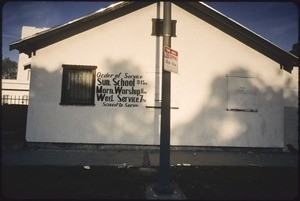 Commercial strip and storefront church along South Western Avenue, Los Angeles, 2005