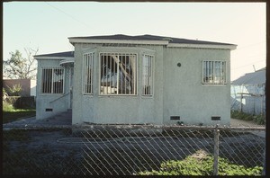 Residential and industrial buildings along Kalmia Street and Laurel Street between East 95th Street and East 97th Street, Los Angeles, 2003