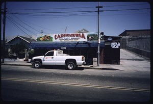 Stores on Maple Avenue from 23rd to 25th Street, west side of street, Los Angeles, 2004