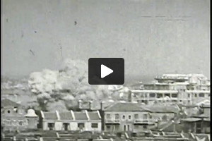 Residents of Zhabei, in Shanghai, view the effects of Japanese aerial bombardment, 1937