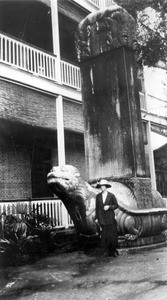 Alla Mae Moody next to stele in front of Bridge House Hotel in Nanjing