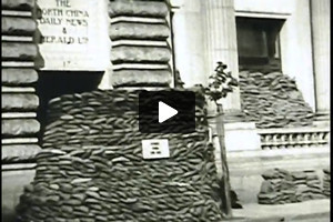 Sandbags used to defend buildings along the Bund in Shanghai against bombardment, 1937